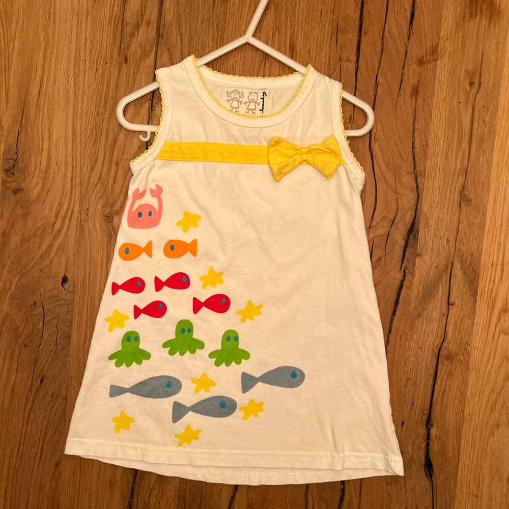 Lourdes. Size 3 years. White "ocean creatures" sleeveless shift dress.
